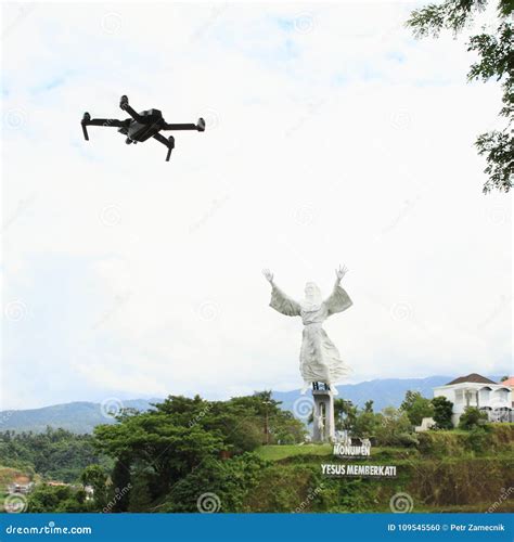 drone flying  monumen yesus memberkati editorial image image  statue angels