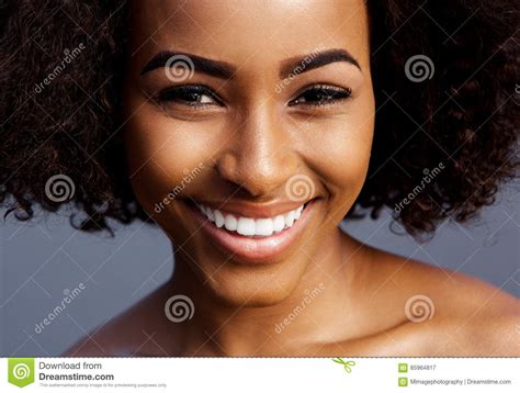 Smiling Black Female Fashion Model With Curly Hair Stock