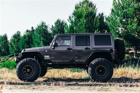 Perfect Fitment Of Nitto Tires On Custom Black Lifted Jeep Wrangler