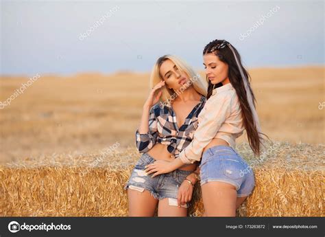Two Happy Girl On The Hay Sexy Brunette And Blonde Women In Field ⬇