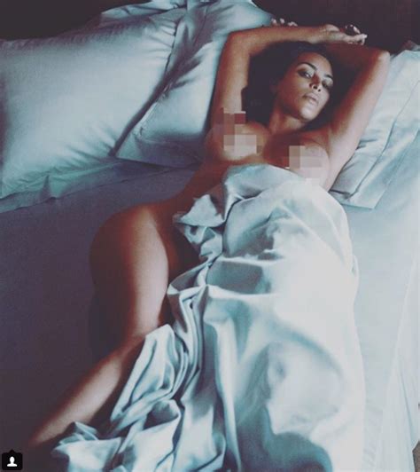 kim kardashian poses naked in bed and celebrates her body in a sexy throwback photoshoot just