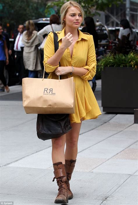 wolf of wall street star margot robbie brightens up new york in a cheerful yellow dress daily