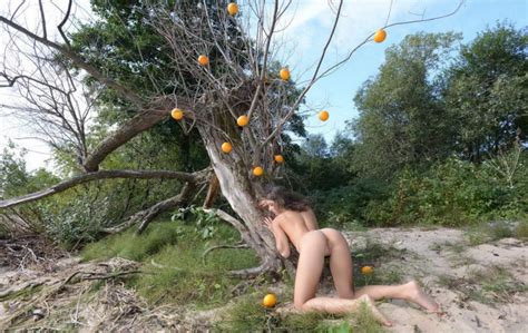 beautiful teen lena posing with oranges outdoors russian sexy girls