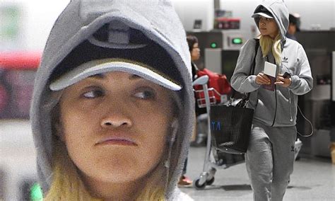 rita ora is almost unrecognisable as she goes make up free
