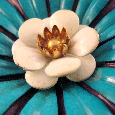 1960s blue and purple enameled metal flower power pin retro jewels