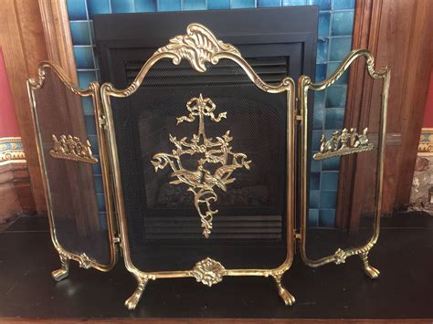 ornate gold fireplace screen  front   fire place