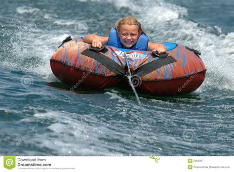 girl water tubing with a smile stock image image of fast float 2956317