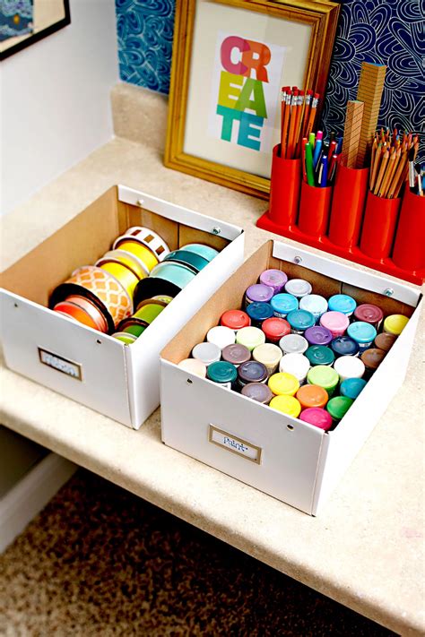 boxes filled   colored markers  pencils sitting