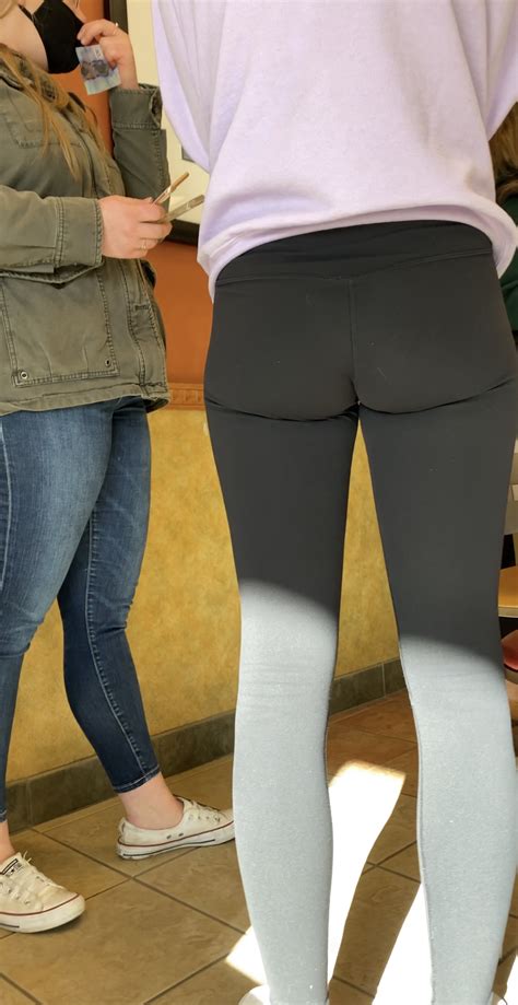 teens going into subway restaurant spandex leggings and yoga pants