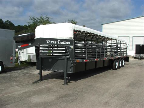 stg texas trailers  gooseneck stock trailer  triple axles