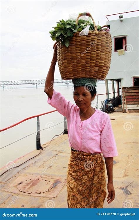 myanmar woman carrying  basket   head editorial image image