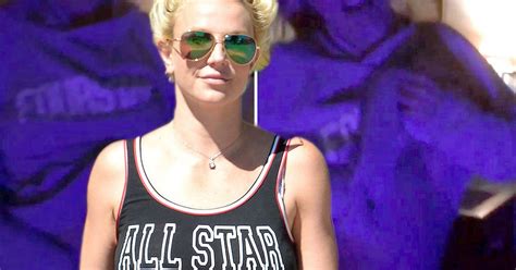 britney spears flashes her boobs as she dances around her house in