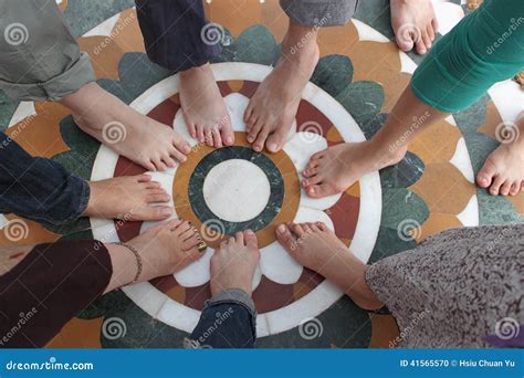 feet forming  circle stock photo image