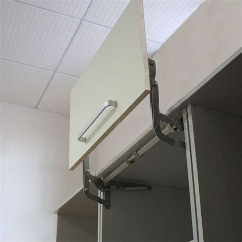 arm mechanism hinges vertical swing lift  stay pneumatic  cabinet boggle  cabinet