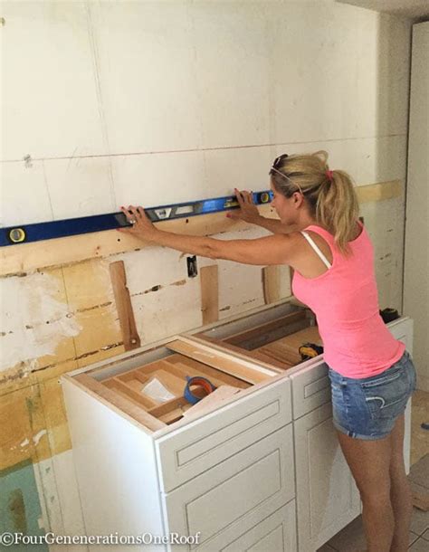 kitchen renovation series installing  cabinets