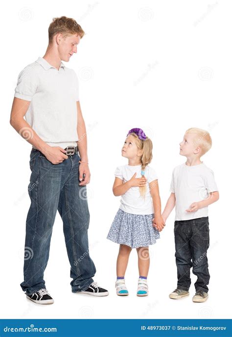 Younger Brother And Sister Look At Older Brother Royalty Free Stock