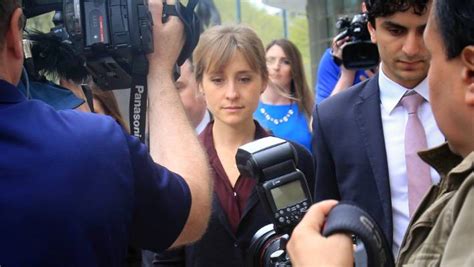 smallville actress and self help guru in court more sex cult arrests expected nz