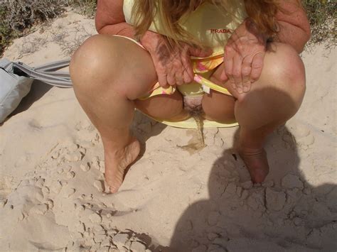 my wife peeing in a public beach foot job on yuvutu