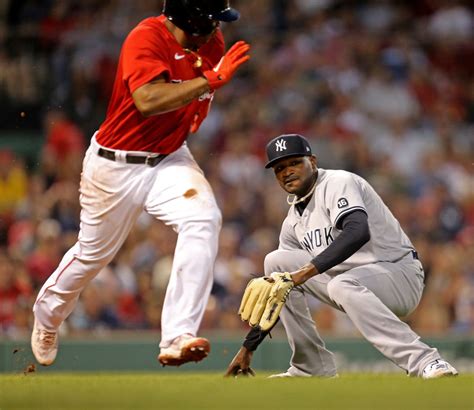 yankees red sox game postponed  players test positive  covid