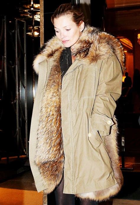 Kate Moss Is Wearing A Fur Lined Army Green Jacket Fashion Kate