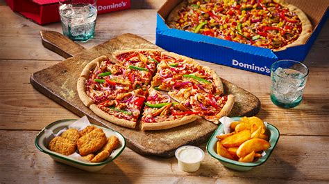 dominos launches vegan chicken nuggets  pizza vegan insight