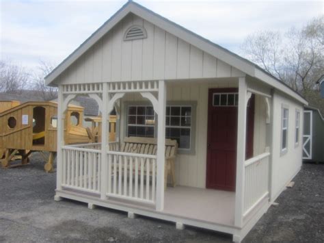 amish built shed  covered porch shed  tiny house amish barns barn construction