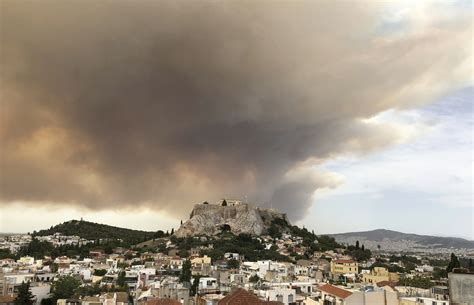 residents flee forest fire  greek capital  athens
