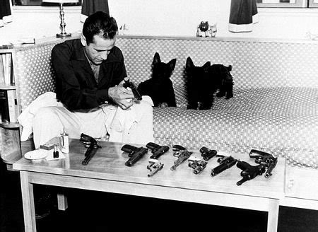 humphrey bogart cleaning  guns   dogs    roldschoolcool