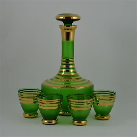 vintage green and gold glass decanter set