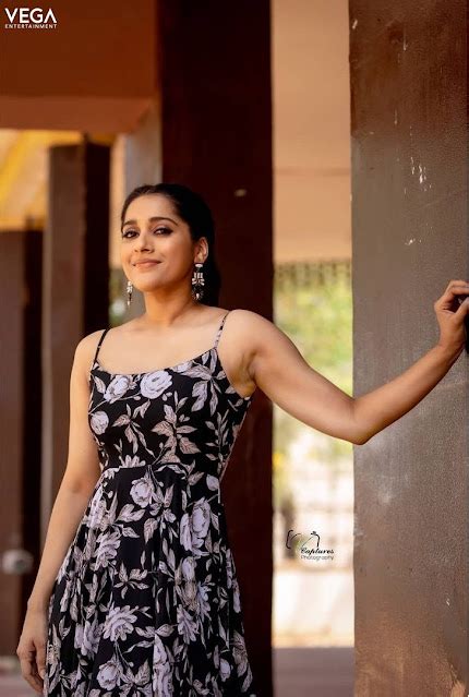 Rashmi Gautam Sexy Black Dress Photoshoot Stills Navel