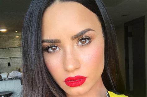 Demi Lovato Sorry Not Sorry Singer Flashes Bulging Boobs In Low Cut