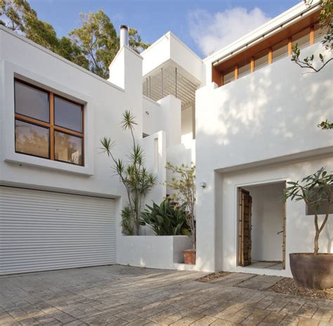 stunningly reinvented australian home features towering indoor outdoor courtyard modern house