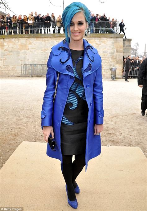 katy perry clashes her blue hair with an eye catching coat at paris