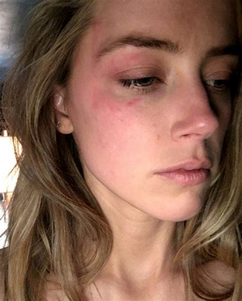 Amber Heard Is Pictured Smiling Hours After Johnny Depp S Iphone