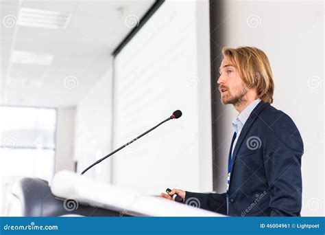 handsome young man giving  speech stock photo image