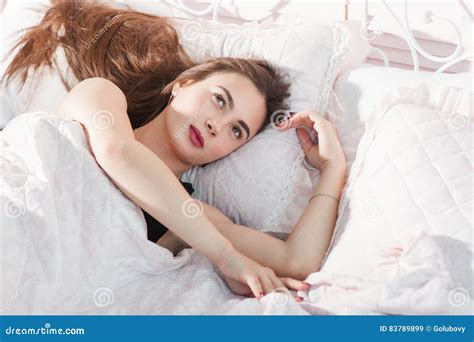 Pleased Young Woman Dreaming In Bed Free Space Stock Image Image Of