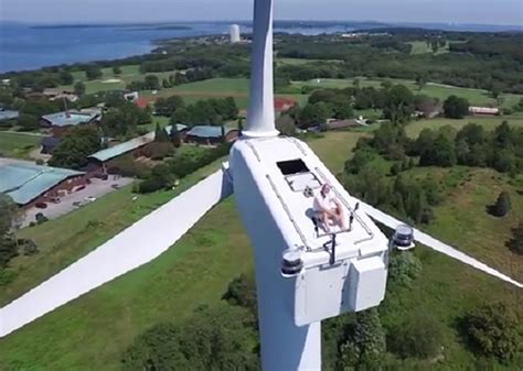 drone catches man sunbathing  top  wind turbine video