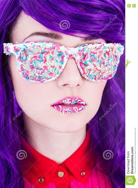 close up portrait of beautiful woman with purple hair and