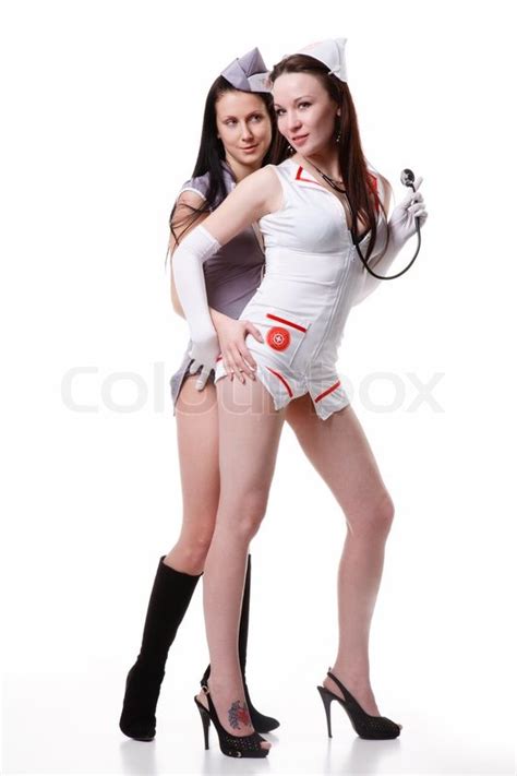 Two Sexy Girls Stewardess And Nurse With A Stethoscope