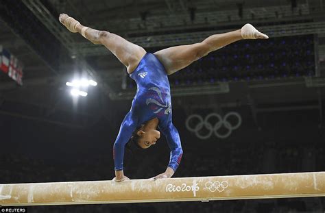 Spectacular Photos Show Gymnasts Gravity Defying Skills