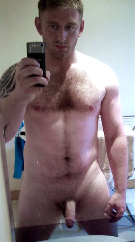 strong fella showing off his soft penis nude men selfies