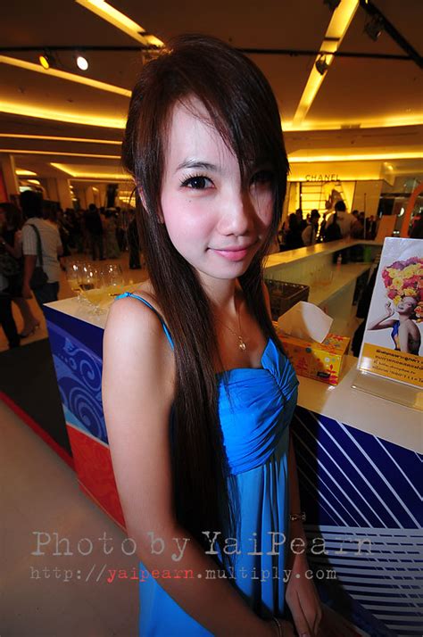 pretty thai lady presentor drinking products page milmon