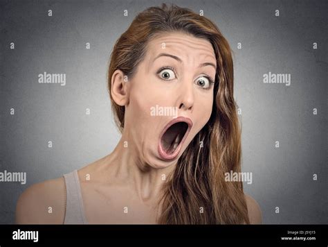 surprise astonished woman closeup portrait woman looking surprised in