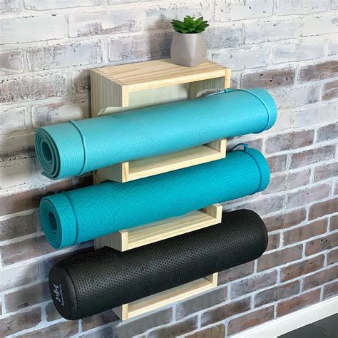 yoga mat holder wall mounted handmade wood yoga mat rack etsy