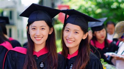 identical chinese twin sisters praised for their brains and beauty