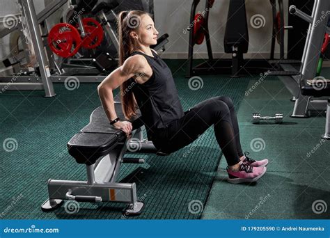 Fitness Athlete Woman Doing Push Ups Exercise On Bench Training