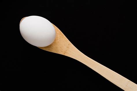 egg  spoon egg   wooden spoon   black backgr flickr
