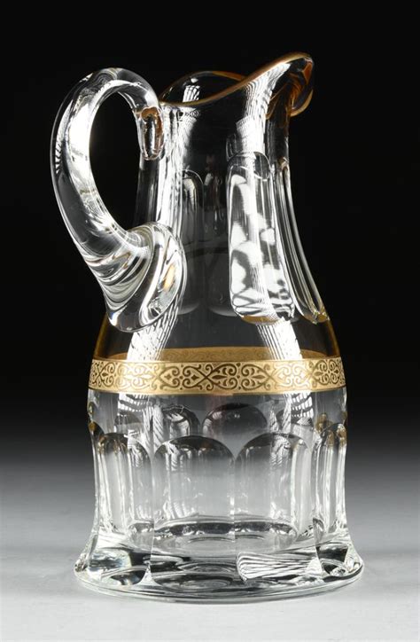 A Pair Of Moser Cut Crystal Pitchers In The Adela Melikoff