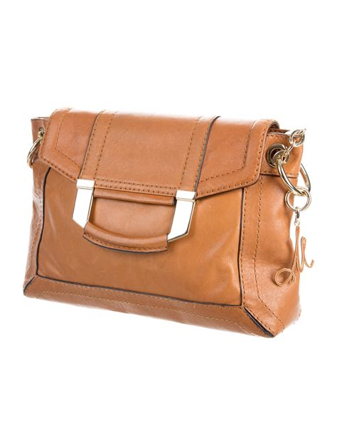 milly small leather crossbody bag handbags wm  realreal