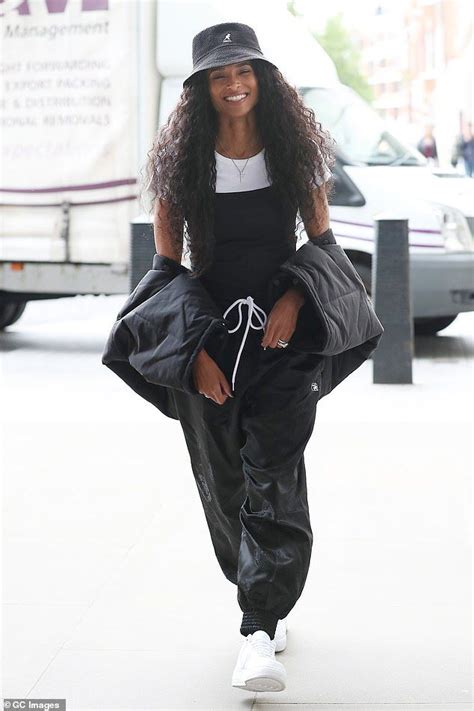 ciara borrows from the nineties in edgy bucket hat with